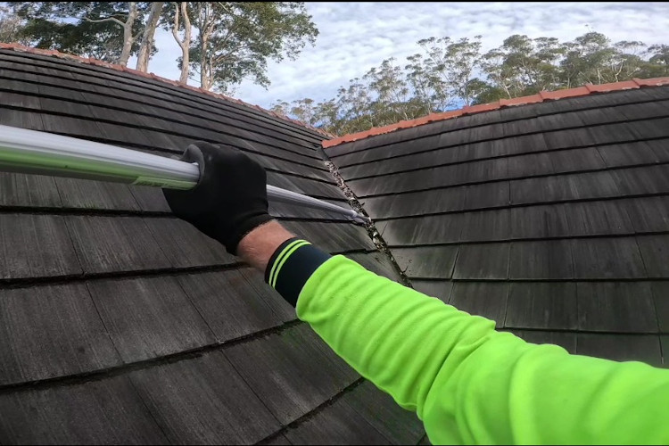 
Employing extended poles for meticulous gutter cleaning, leaving clean valleys on steep roofs in batemansbay