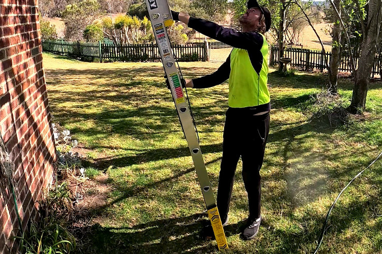 
Gutter cleaning pro with expertise sets up their extension ladder in batemansbay.