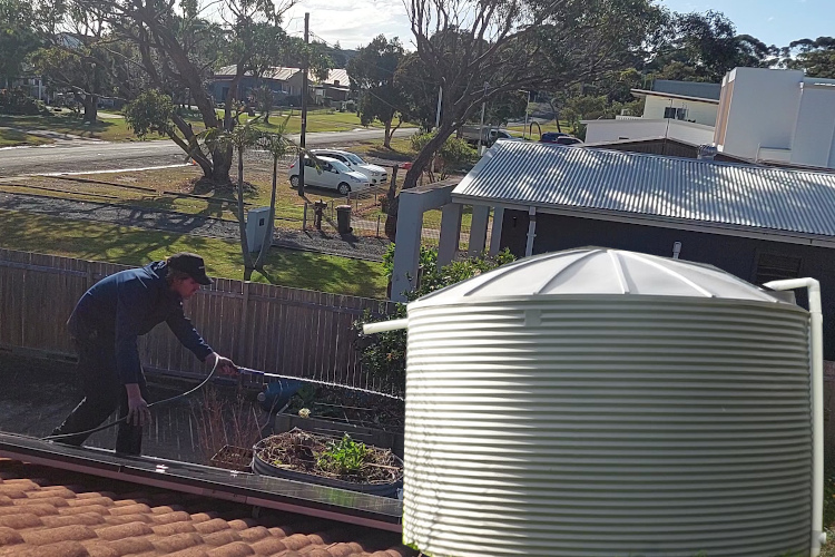 
Gutter Cleaning in Progress at Rainwater-Dependent batemansbay Property